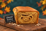 Almond potica with chalkboard and almonds